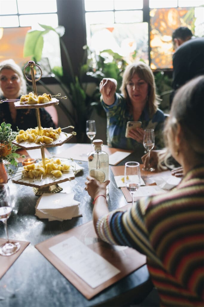 Partygoers embracing the tasting (Photo by Afritina Coker )