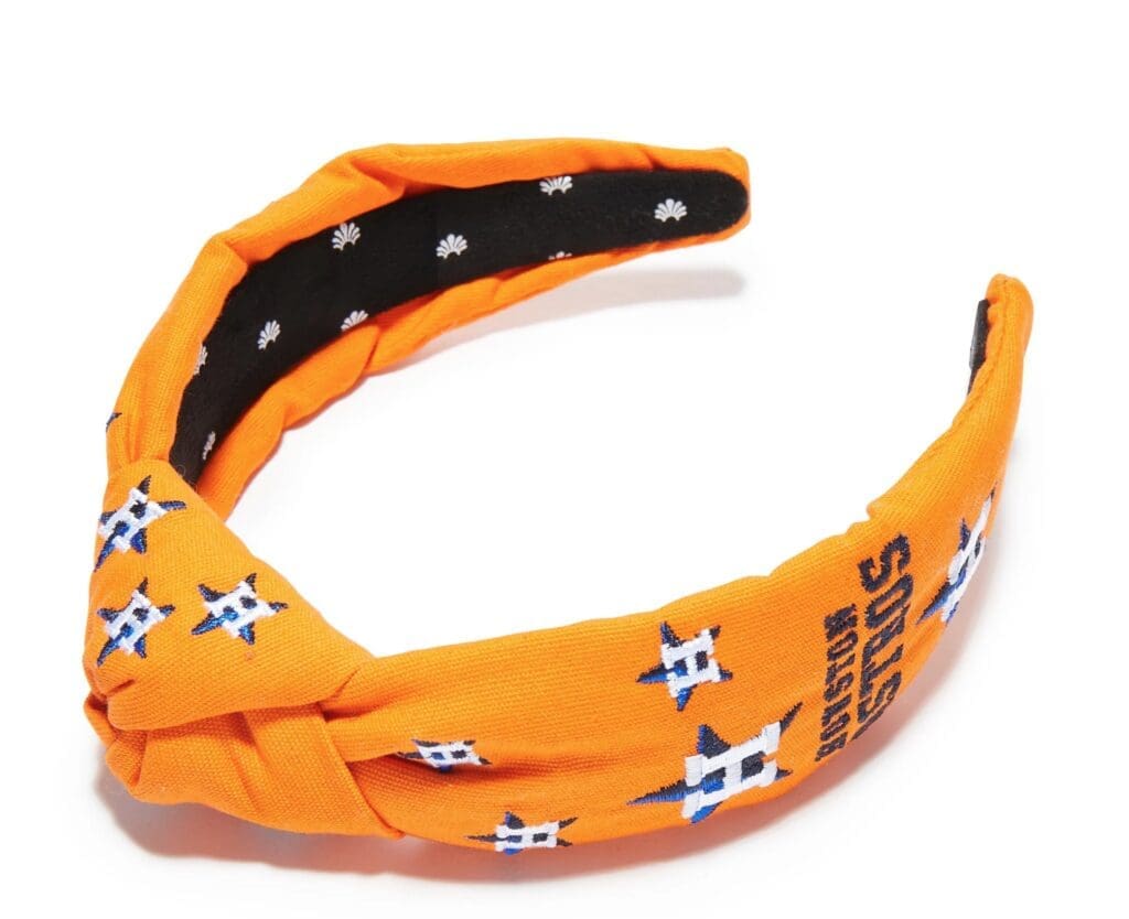 Lele Sadoughi salutes the Houston Astros with this orange embroidered headband.