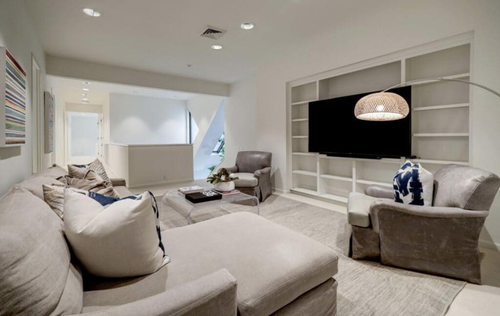 A TV room atop the staircase in the home at 3404 Chevy Chase. (Photo by TK Images)