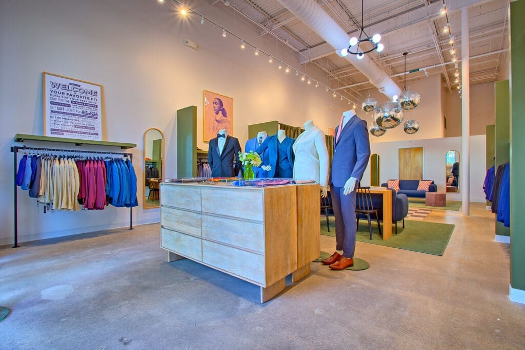 An array of mannequins show off SuitShop's chic options. (Photo by Adam Hart)