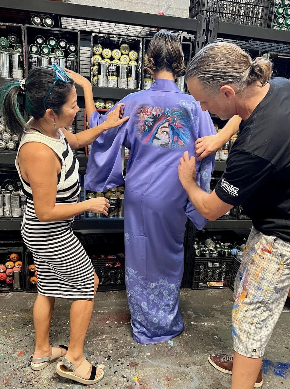 "Mr. D 1987" and Tina Zulu discuss art direction for the "Keep Your Eyes on the Road" kimono to be featured at the MFAH Trunk Show. (Courtesy of Kimono Zulu)