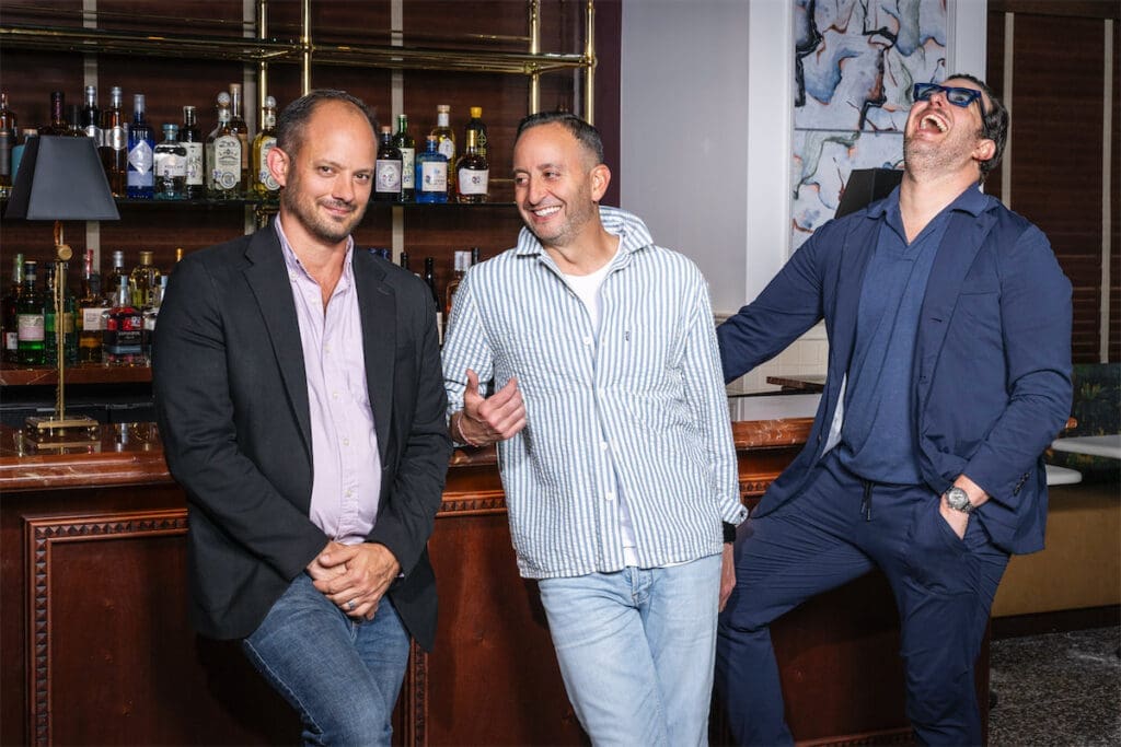 Duro Hospitality co-founders J Chastain, Benji Homsey, and Chas Martin are behind Mister Charles in the former Highland Park Soda Fountain space. (Photo by Evan Sung)