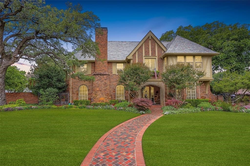 There is curb appeal galore at this historic Tudor style in Fort Worth's coveted Park Hill neighborhood.