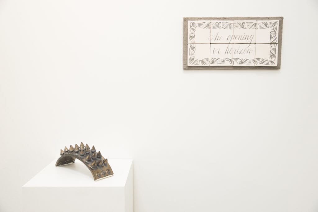 "Bridge II" and "Street sign" by Tamara Santibañez at "I, Ruby: Vol. 1" 
 (Photo by Hung Ngo)