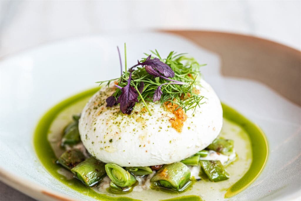 The Charred Snap Pea Burrata at Margaret's is also made with local ingredients. (Courtesy)