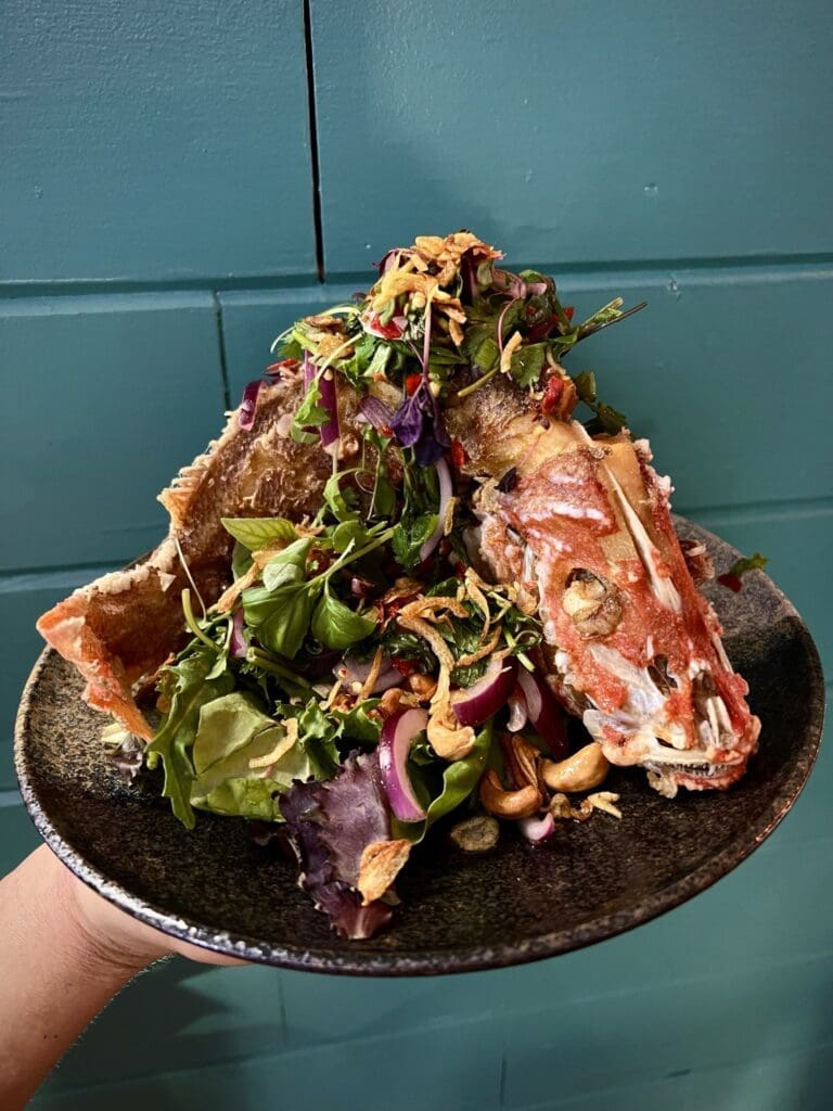 The James Beard Award-Winning chef Benchawan Jabthong Painter creates Thai dishes like this crispy fried Gulf snapper at her restaurant Street to Kitchen.
