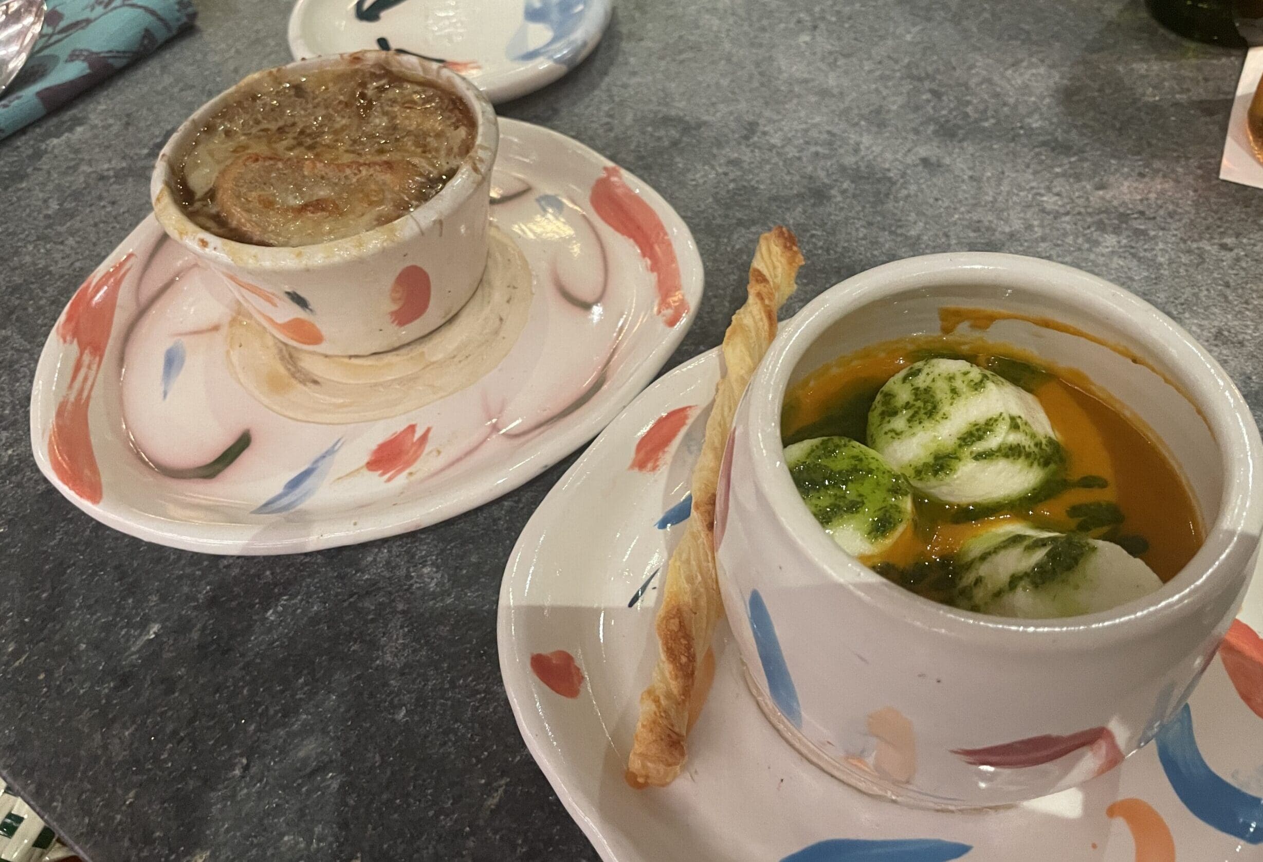 The French onion soup (left) and the marshmallow soup are served in hand created pottery at the new Rise in The Woodlands.