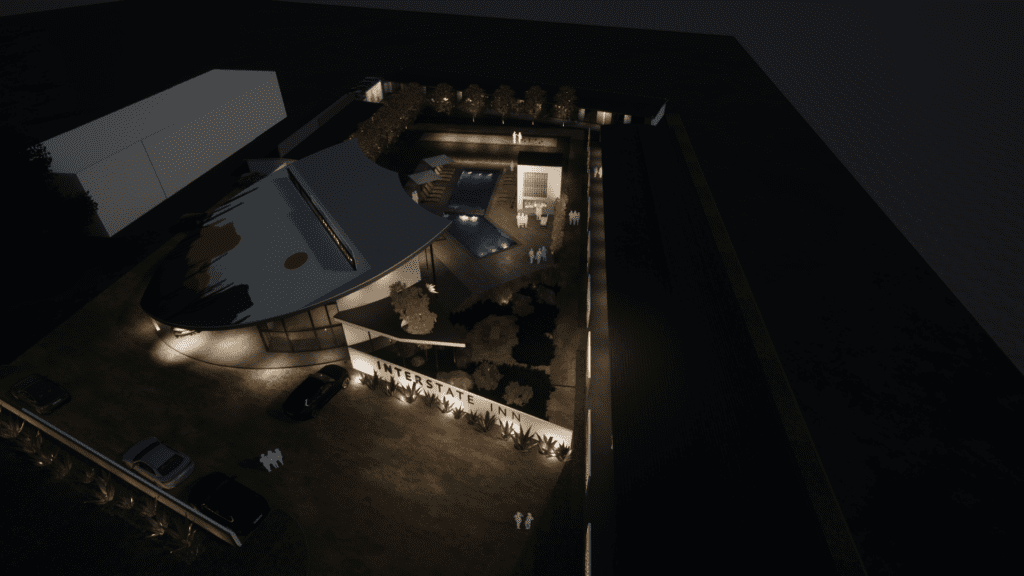 Interstate Inn -  aerial view of the property by night.