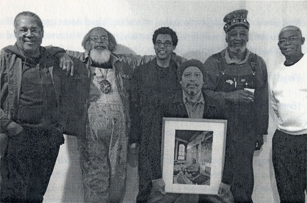 From left: Project Row Houses co-founders George Smith, Bert Long, Jr., Rick Lowe, Bert Samples (holding a framed photo of the late James Bettison), Jesse Lott, and Floyd Newsum. (Courtesy Project Row Houses, Houston)