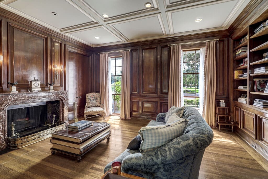 The beautifully paneled library in the Birdsall Briscoe home at 3425 Sleepy Hollow Court. (Photo by TK Images/Courtesy of Compass)