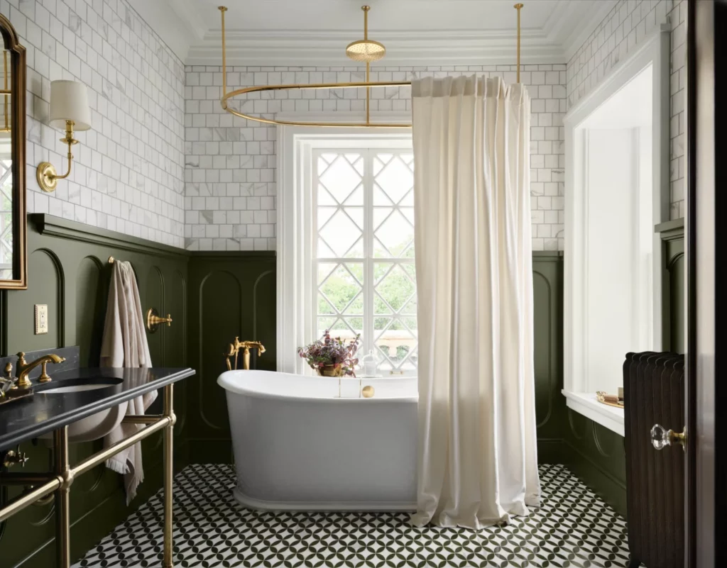 Guest bath with soaking tub and period appropriate details. (Photo by Lisa Petrol)