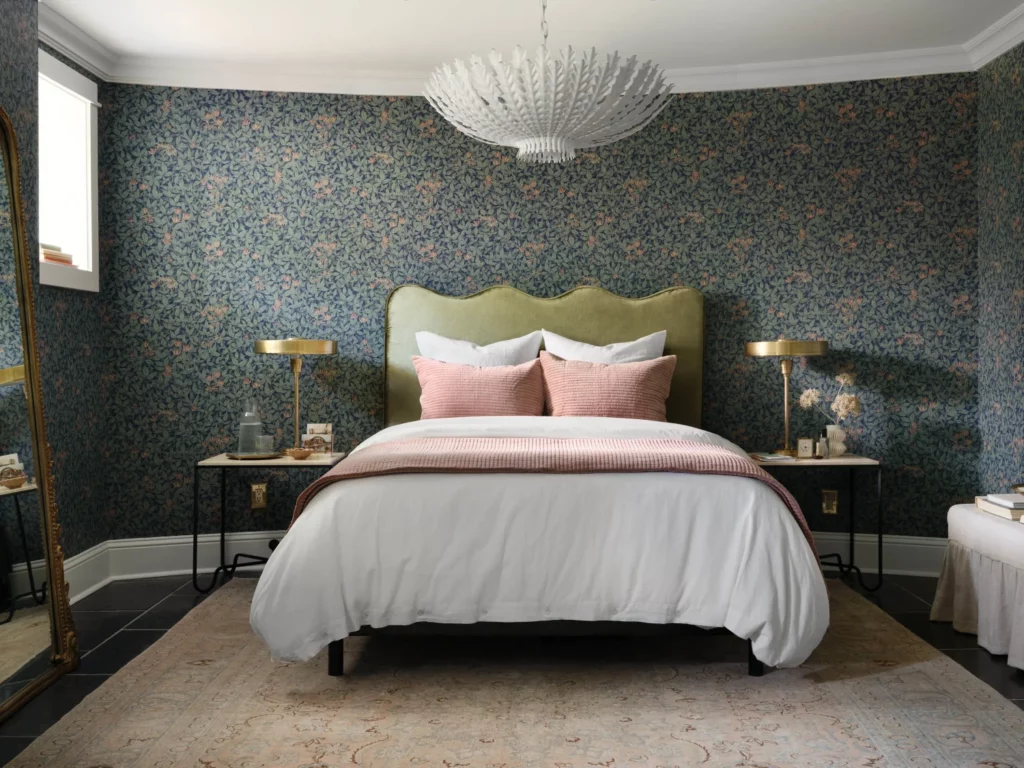 One of the home's four stately bedrooms, this one with fresh tile, wallpaper and lighting overhead. Very Fixer Upper. (Photo by Lisa Petrol)