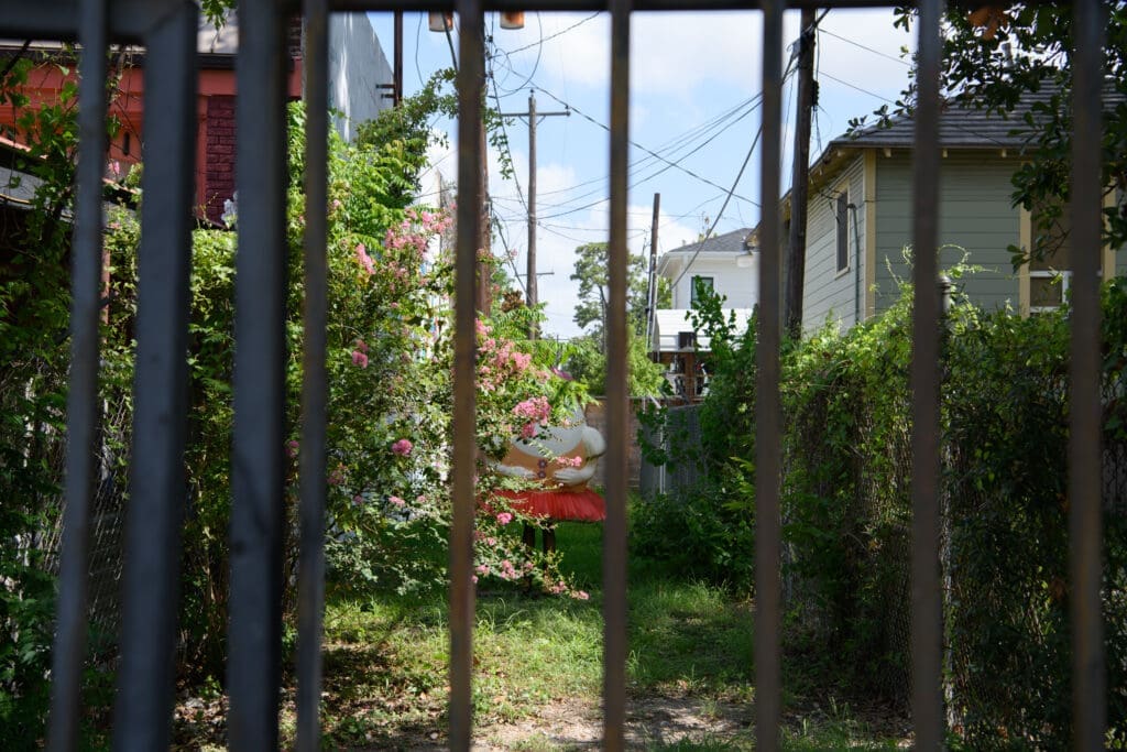 The gate and Humpty Dumpty statue at the mural entrance (Photo by Saranna Zhang/Kevin Zhang Photography)