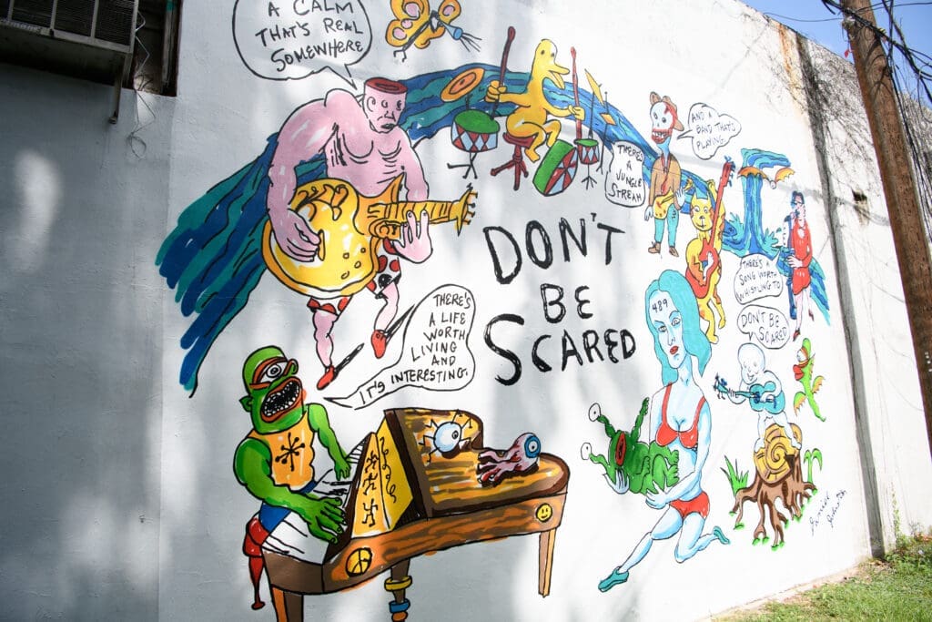 The "Don't Be Scared" mural at Redbud Arts Center, honoring the late Daniel Johnston (Photo by Saranna Zhang/Kevin Zhang Photography)