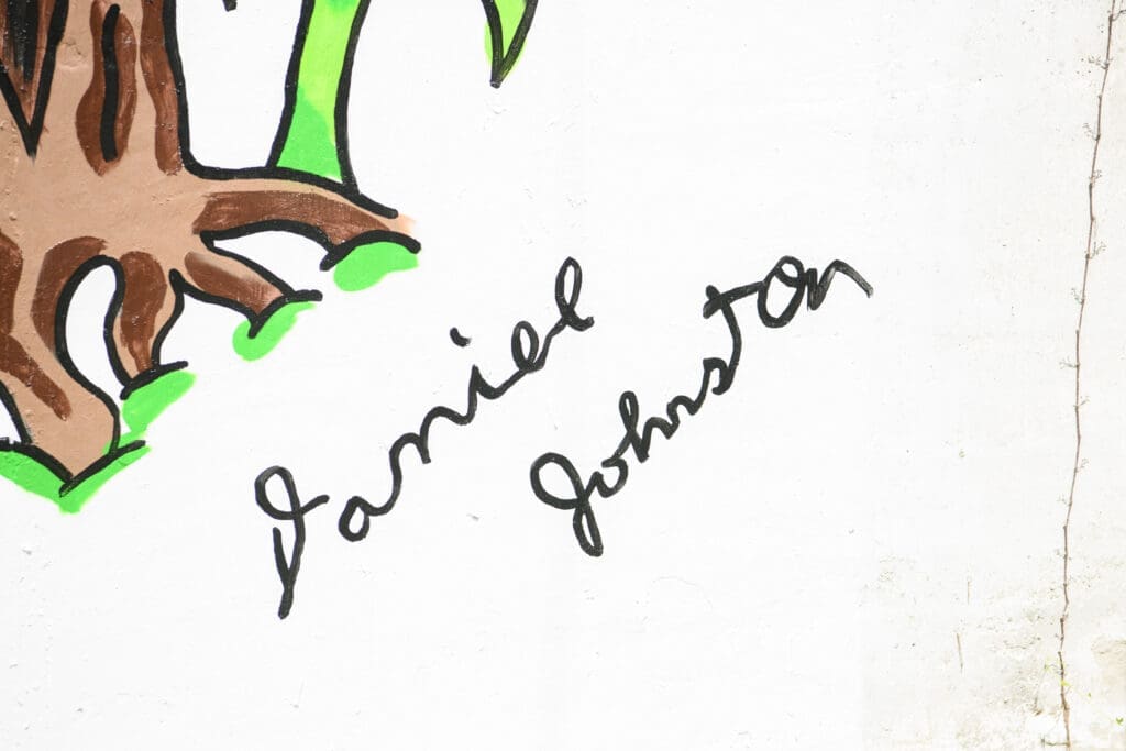 Recreation of Daniel Johnston's signature on the "Don't Be Scared" mural at Redbud Arts Center (Photo by Saranna Zhang/Kevin Zhang Photography)