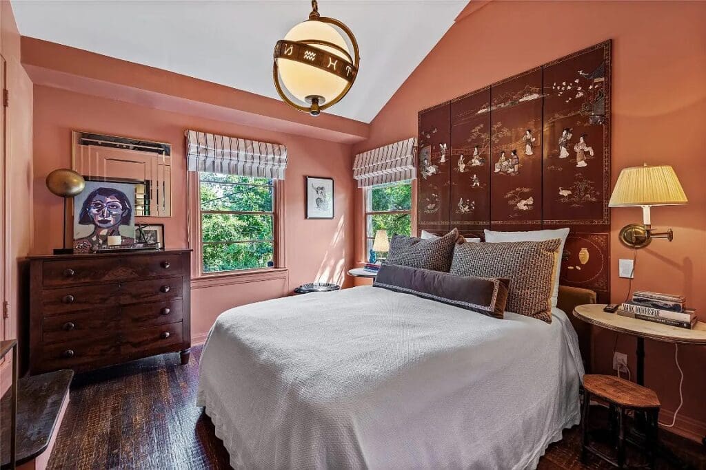 The secondary bedroom features Visual Comfort's striking Zodiac Lantern.