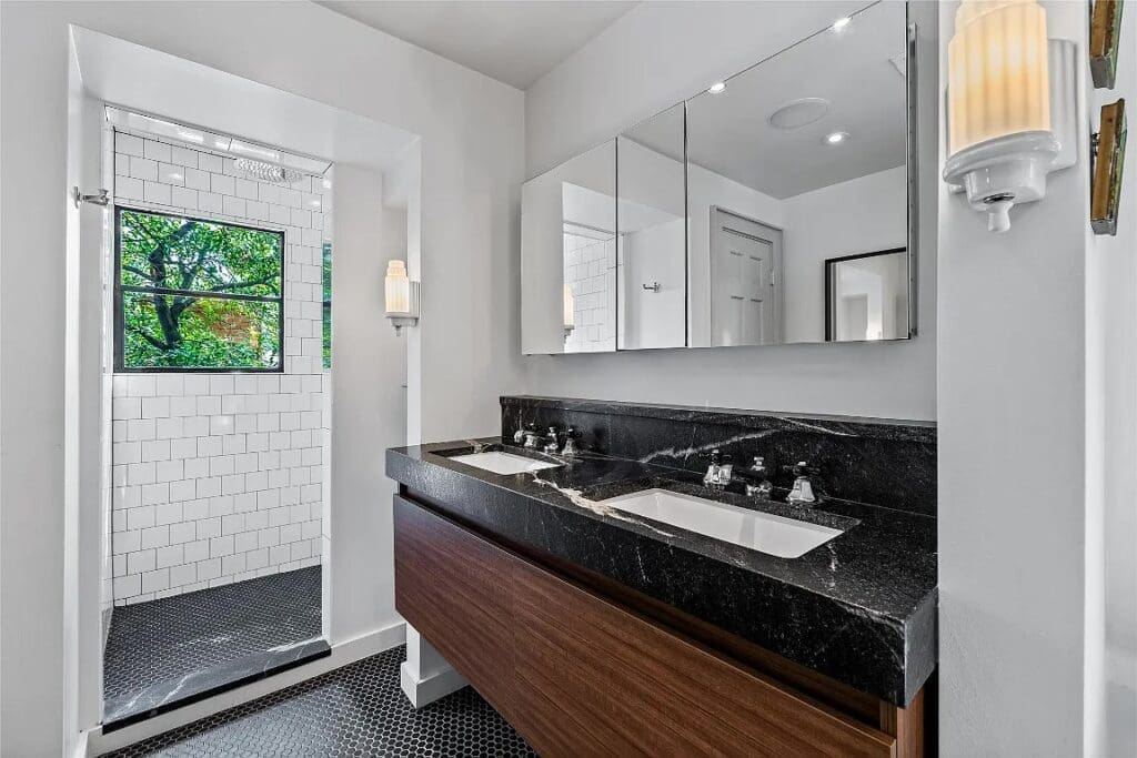 A large walk-in shower in the primary bathroom.