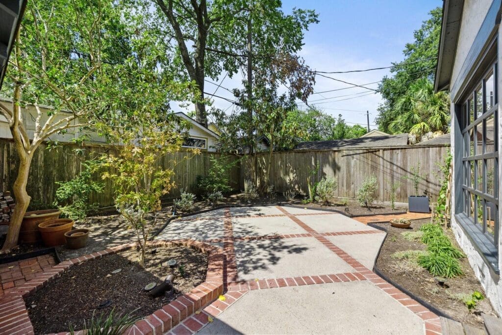 The back terrace at 1635 Hawthorne in Houston's Montrose neighborhood. (Photo by Josh Gremillion for Martha Turner Sotheby's International Realty )