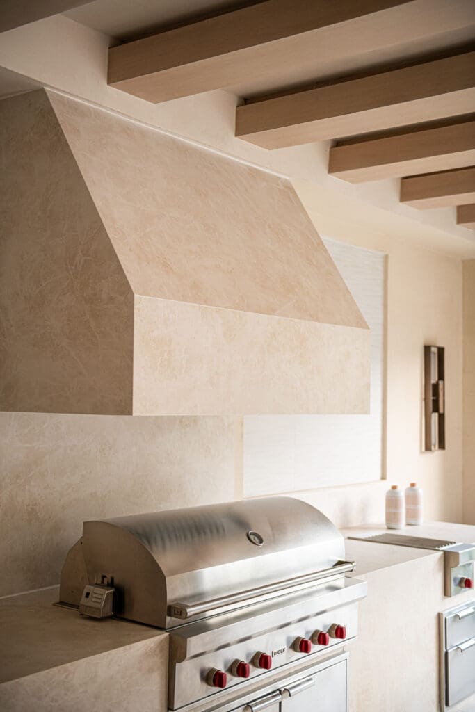 Whether you're cooking inside or outside, top of the line appliances abound throughout the home.