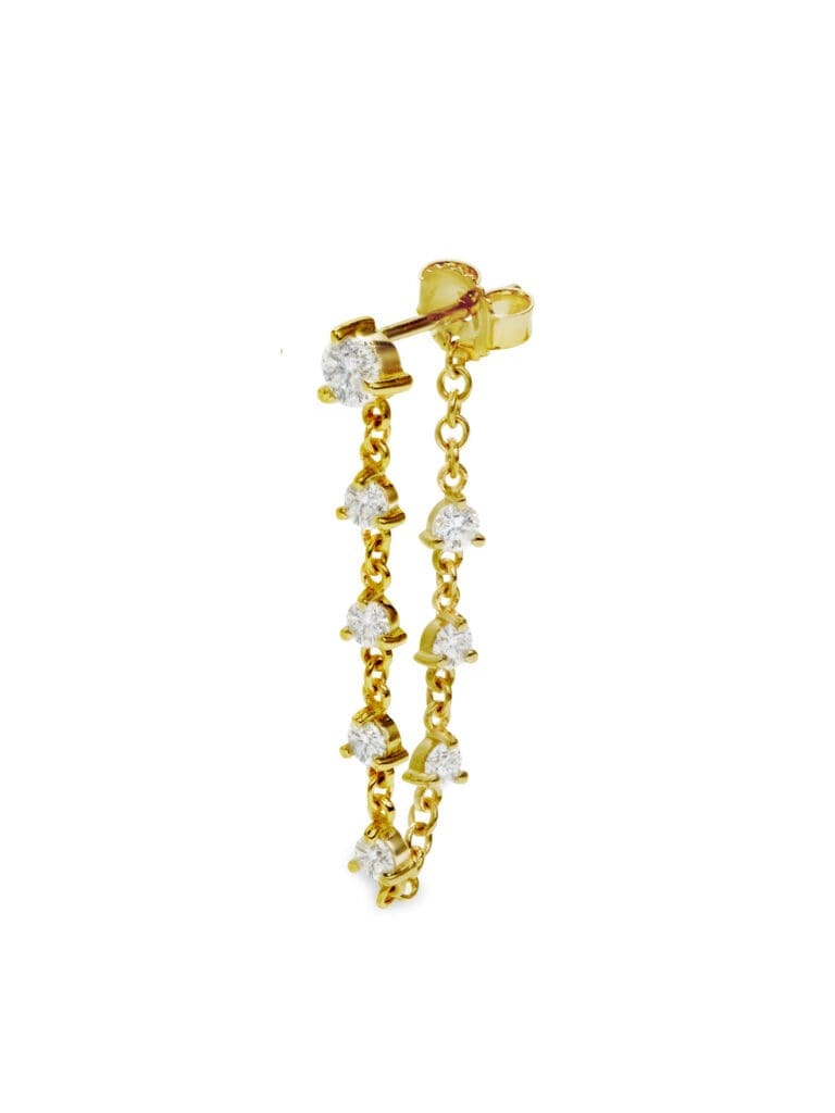 Crafted in 14k yellow gold and detailed in sparkling round diamonds this Carbon & Hyde earring is the perfect piece to add some edge to your everyday look.