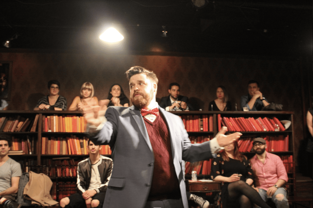 The host sets the scene and and prepare the audience for a night filled with booze and The Bard! (Photo by © Drunk Shakespeare)