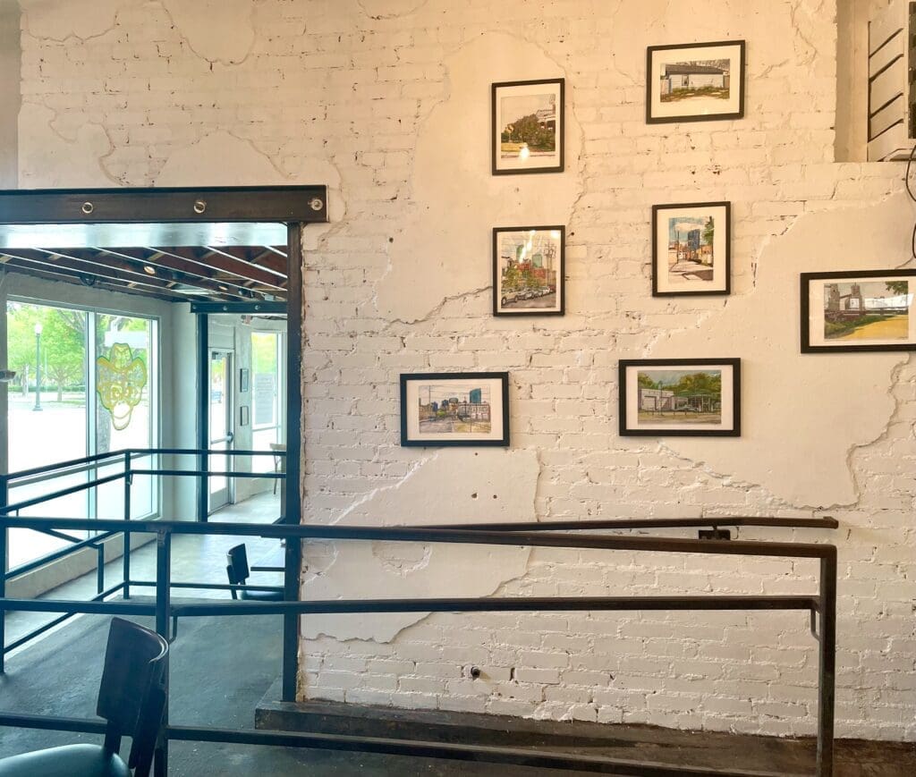 Eazy Monkey with architectural renderings by Andrew Dilda's father-in-law. (Photo by Courtney Dabney)