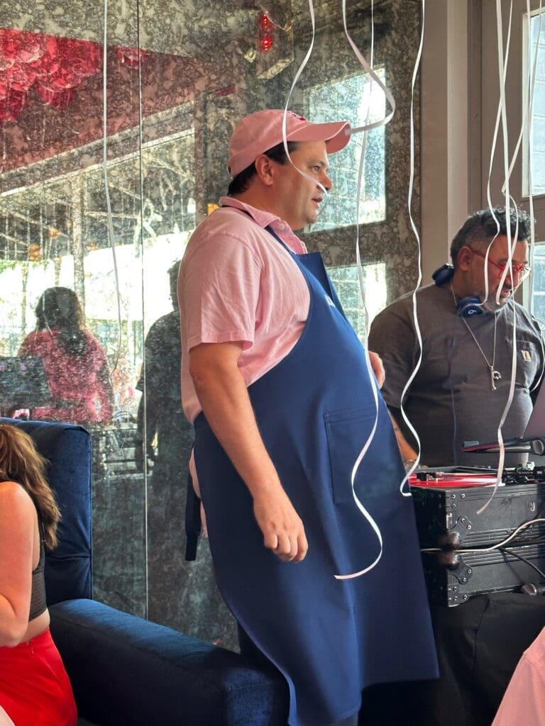 Brasserie 19 chef Michael Hoffman dons pink for Le Barbie Brunch. (Photo by Shelby Hodge)