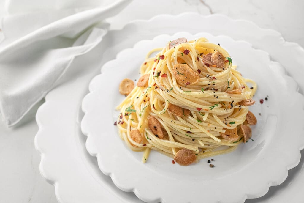 Spaghetti Garlic Onion is among the recipes included in Johnny Carrabba's second cookbook. (Photo by Debora Smail)
