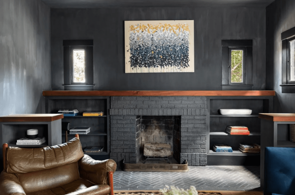 The study with fireplace at 1635 Hawthorne in Houston's Montrose neighborhood. (Photo by Josh Gremillion for Martha Turner Sotheby's International Realty )