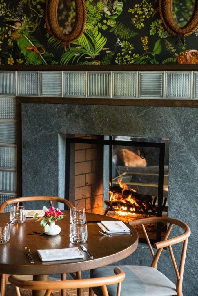 A fireside table at Sojourner, the restaurant at the heart of Southall. 