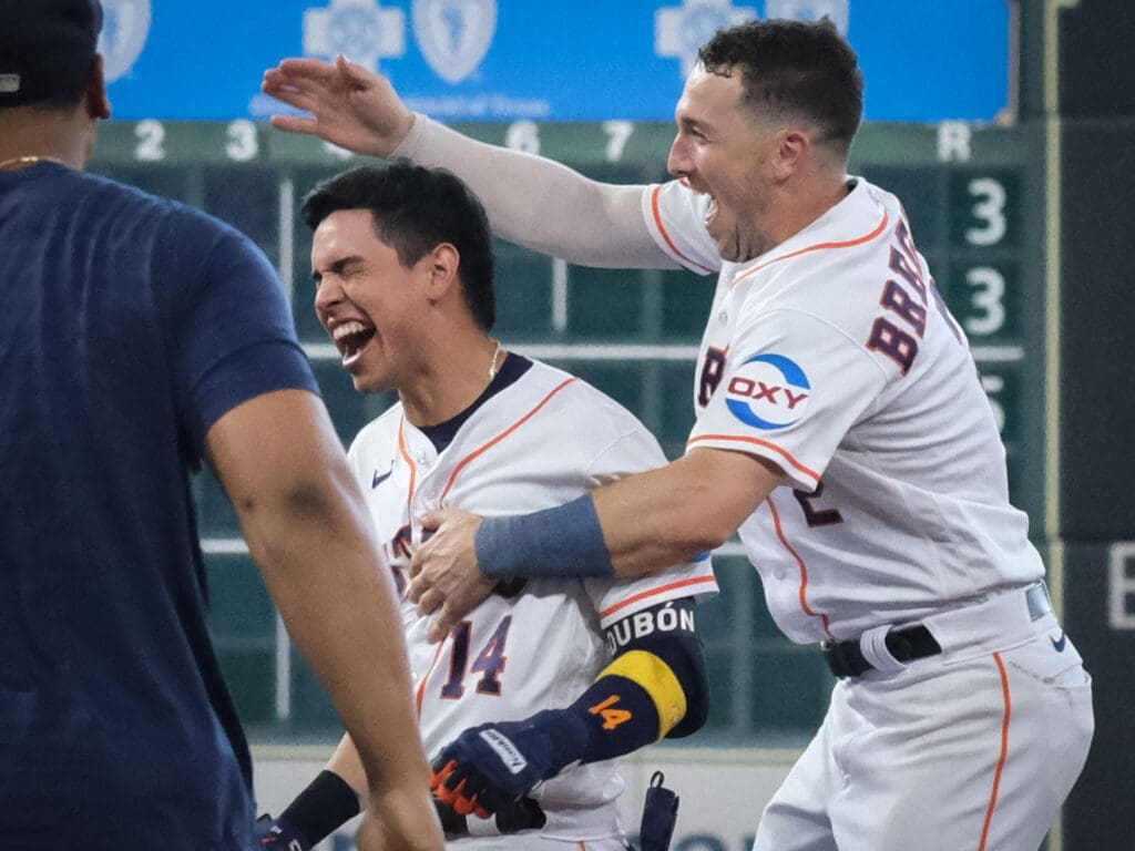 Alex Bregman shows his hops for that Mauricio Dubon bottom of the ninth walkoff win.  (Photo by F. Carter Smith)
