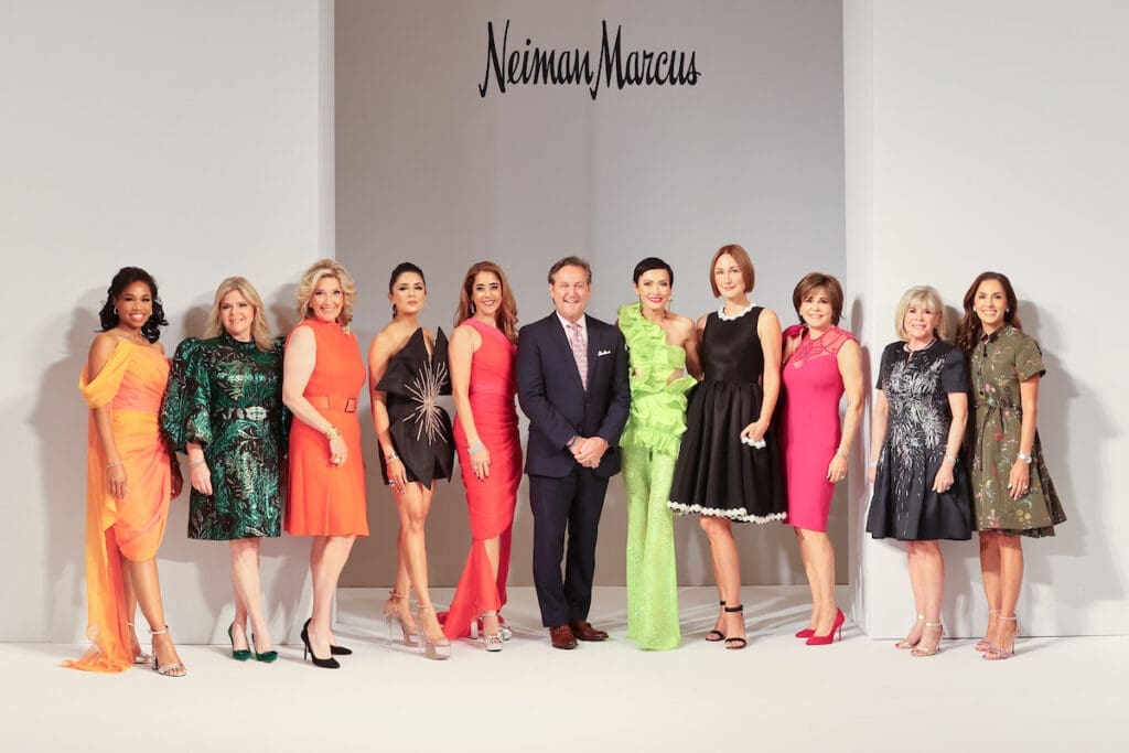 The PaperCity Philanthropy in Fashion Best Dressed honorees on stage with Neiman Marcus executive vice president and general manager Houston Preston Antonini. (Photo by Priscilla Dickson)