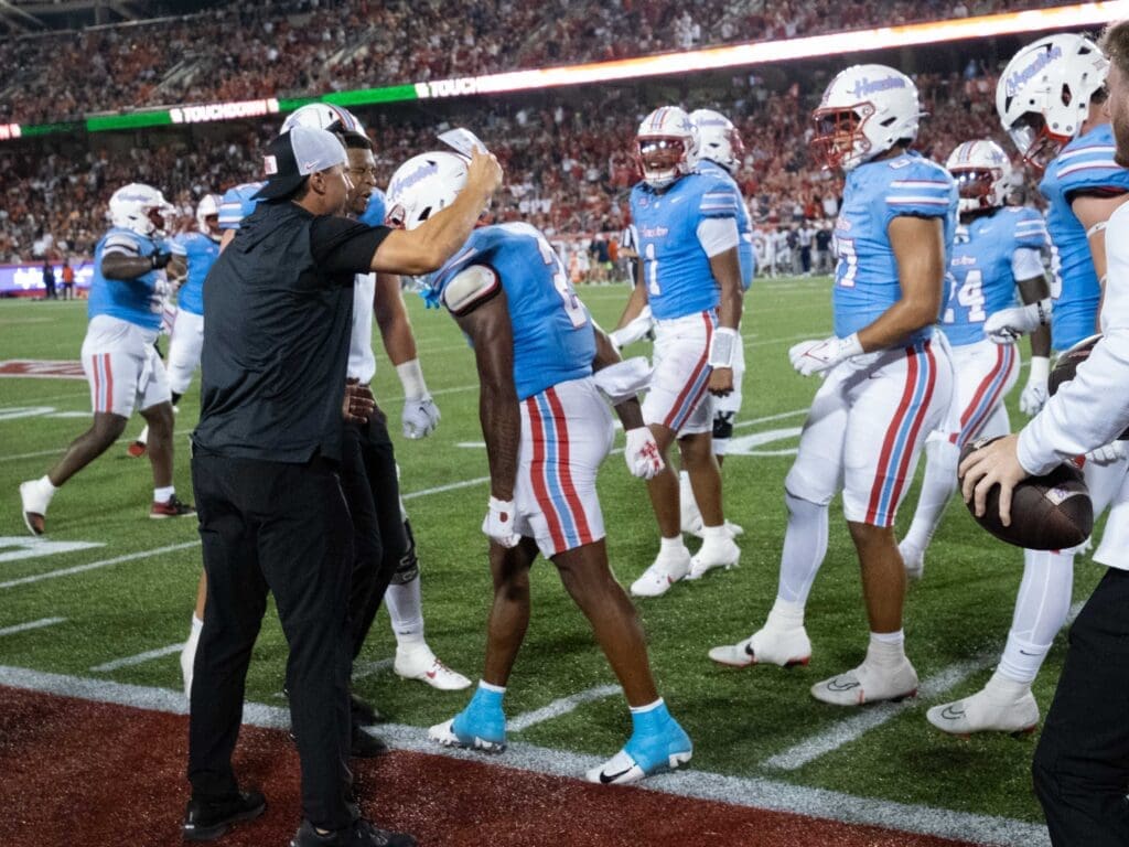 University of Houston receiver Mathew Golden (No. 2) received plenty of love after a key touchdown catch. (Photo by F. Carter Smith)
