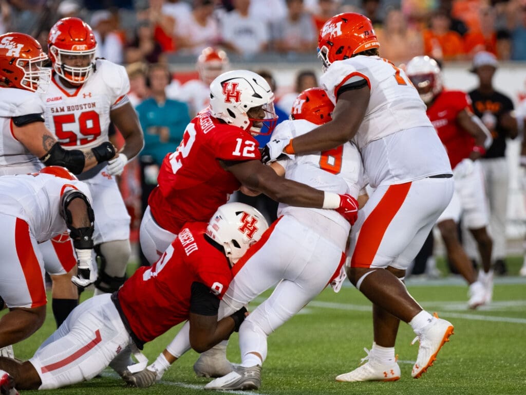 University of Houston edge rusher David Ugwoegbu and Nelson Ceaser (No. 9) can bring plenty of pressure. (Photo by F. Carter Smith)