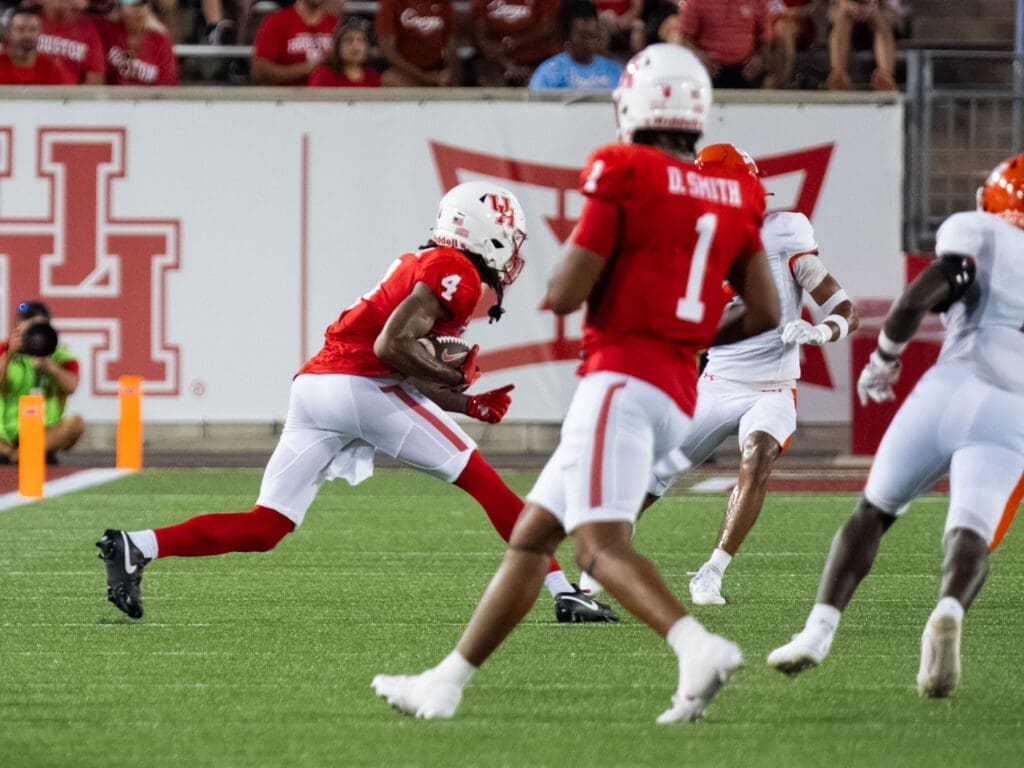 University of Houston quarterback Donovan Smith is good at spreading the ball around.  (Photo by F. Carter Smith)