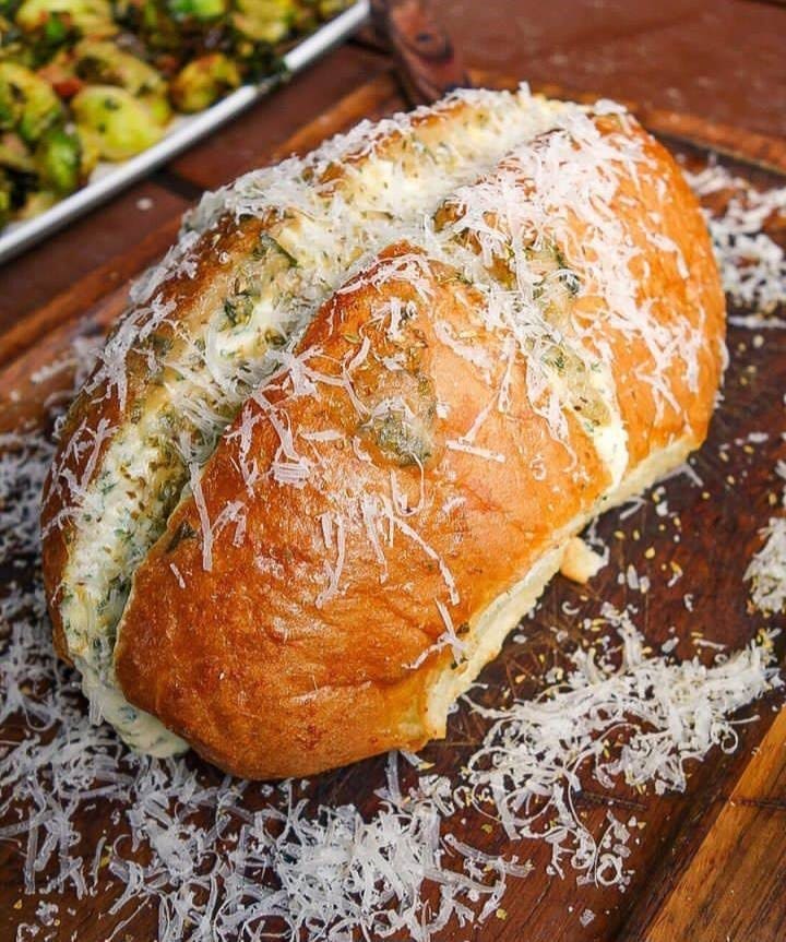 The garlic bread at Dak and Bop ($10) is toasted with herb cream, mascarpone cheese and garlic butter. (Photo by Courtesy of Dak & Bop)