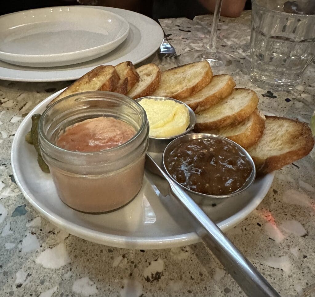 Chef and owner Kat Turner is behind the food at Highly Likely, including this silky and rich chicken liver mousse and prune mostarda.