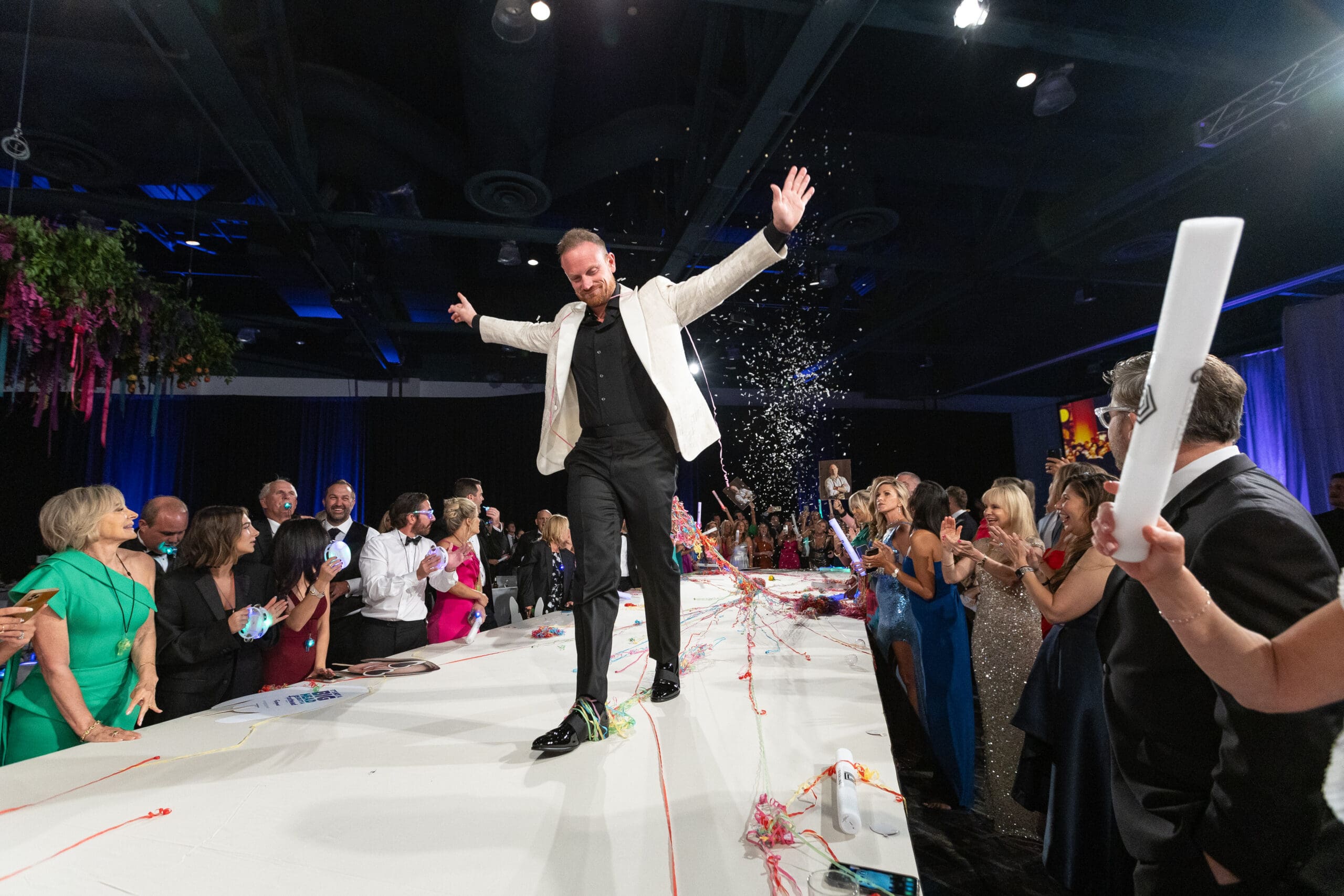 Community Champion Austin Simmons strutted down the runway during The Walk.