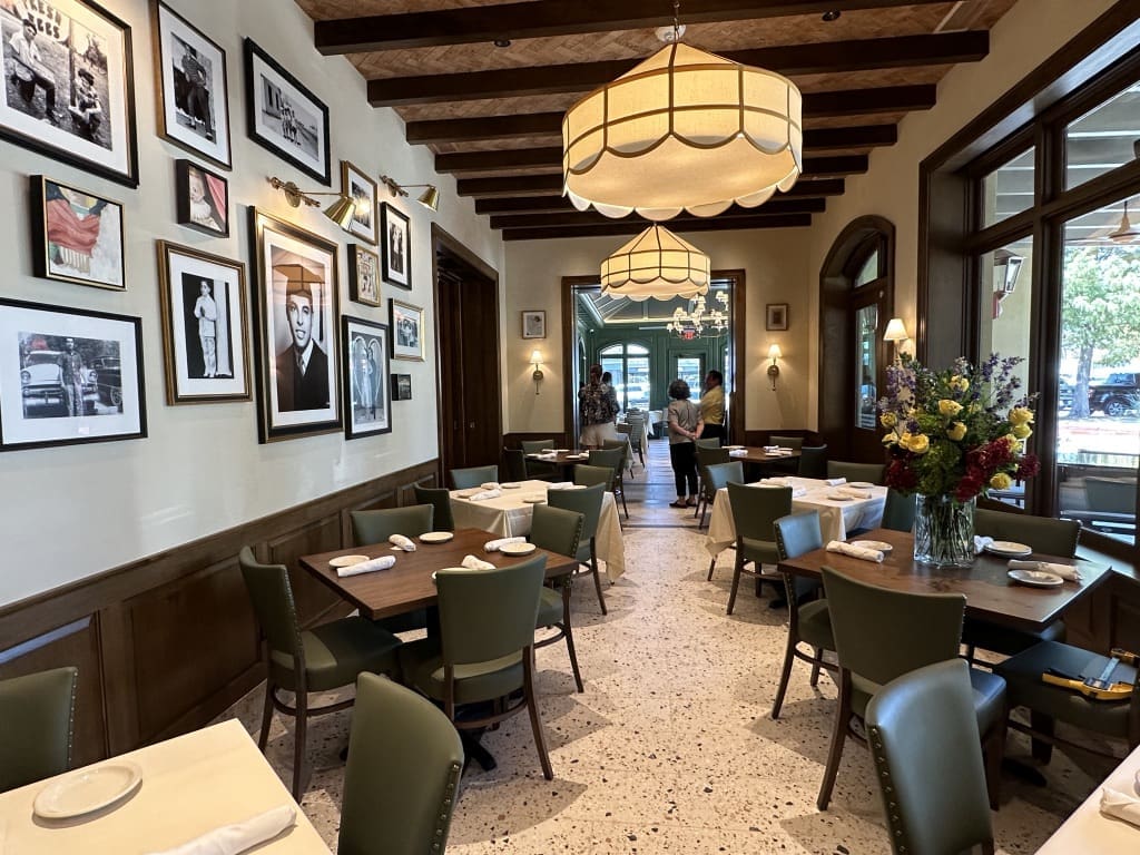 The remodeled Mr. C. Room at Carrabba's on Kirby is a salute to Johnny Carrabba's father with a photo wall in his honor. (Photo by Shelby Hodge)
