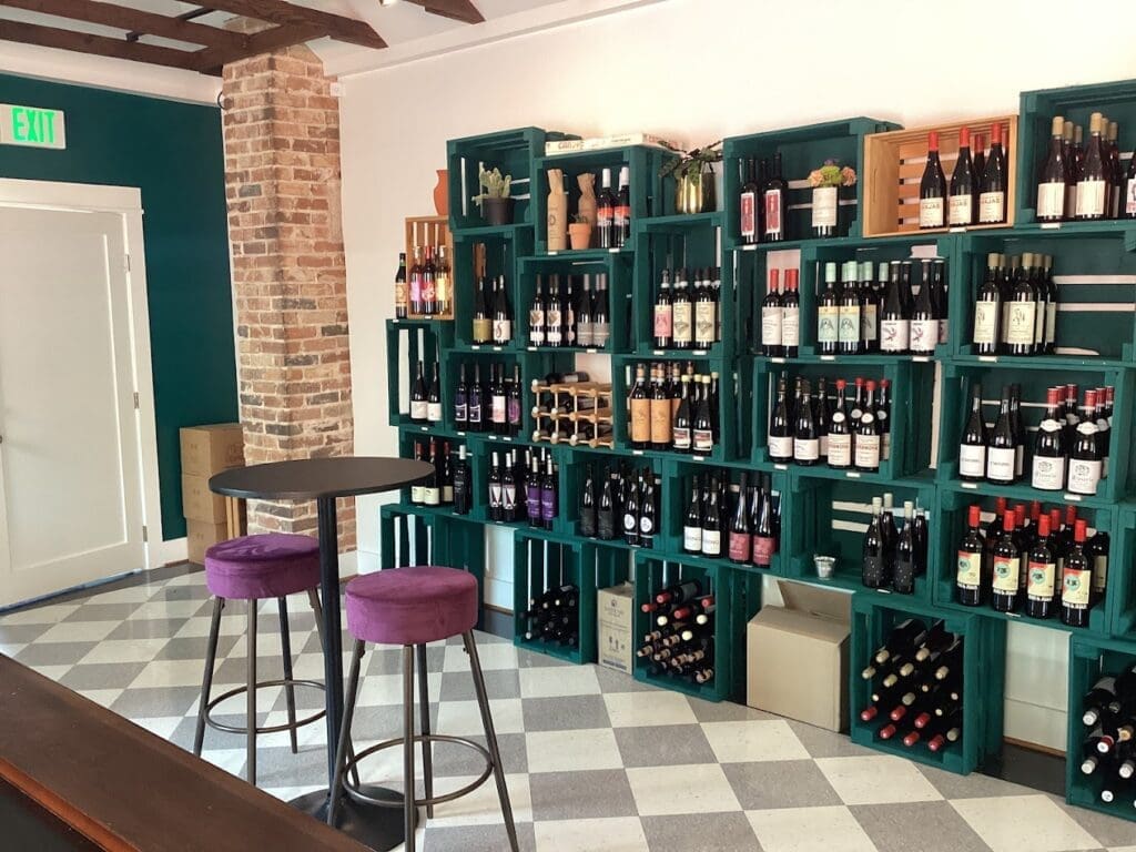 Opened in Bishop Arts in 2023, Ampelos is a natural wine bar with a "wine-dow" on its patio. (Courtesy)
