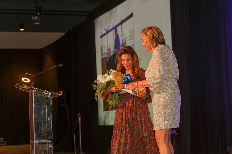 Jennifer Sanchez, left, and MG Tindall took the stage after Sanchez told the story of her daughter's 10 years at the ranch. (Photo by Gerri Francis)