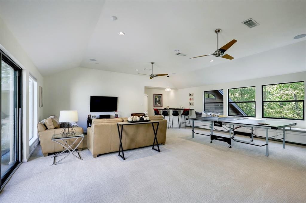 There are several spaces to enjoy upstairs, with a massive game room, bar and balcony. Perfect for parties. (Photo by TK Images)