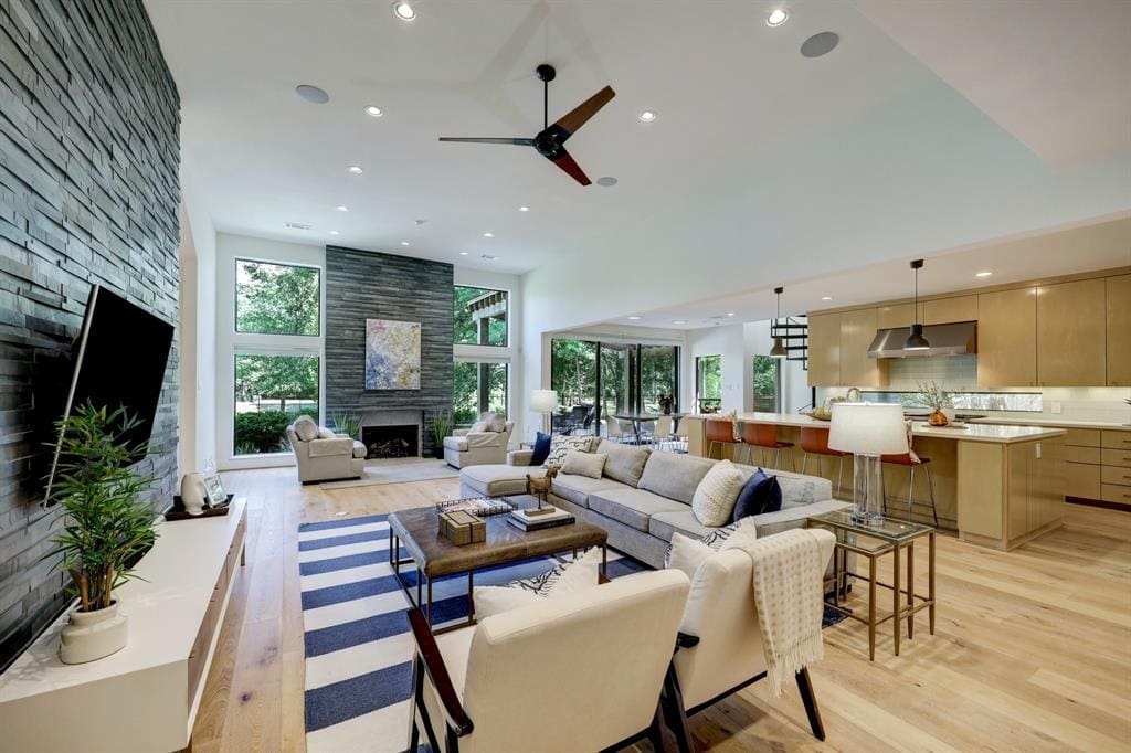 The mid-century modern aesthetic and neutral palette makes the home feel cozy and inviting. (Photo by TK Images)