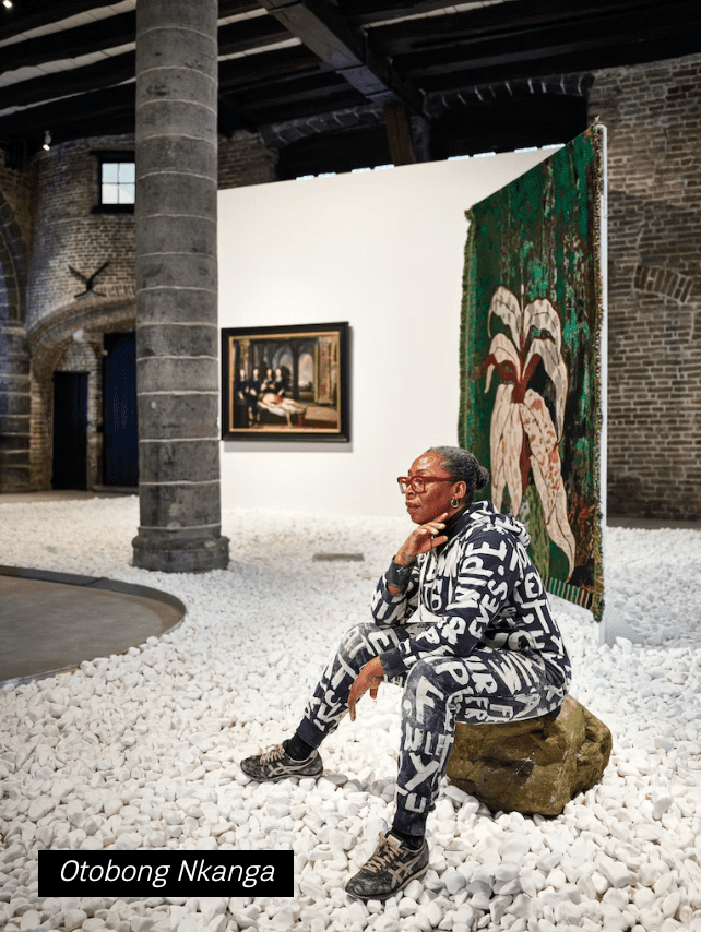 Artist Otobong Nkanga sits within her Musea Brugge installation. (Courtesy Musea Brugge)
