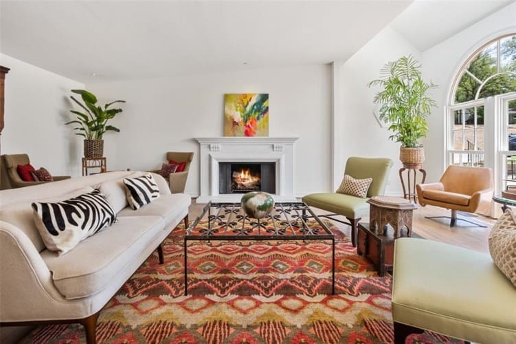 412 Hazelwood's arched windows add to the drama of the cozy formal living room.