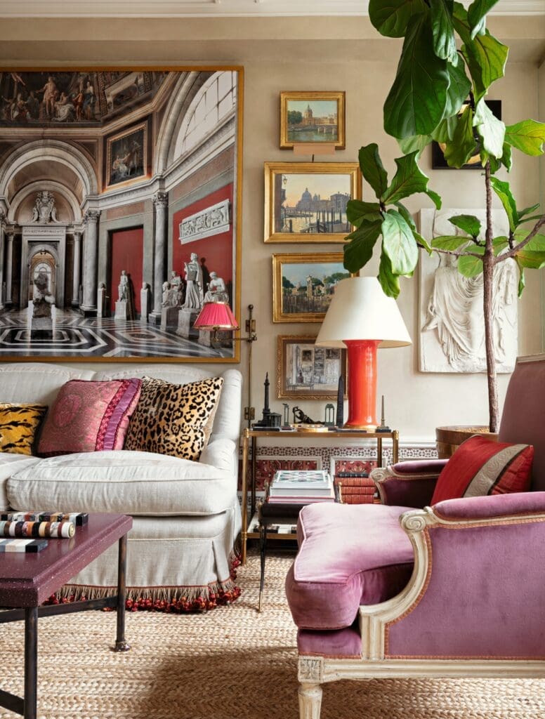 In a living room designed by Alexa Hampton, a Massimo Listri photograph is above the sofa.  (Photo by Steven Freihon)