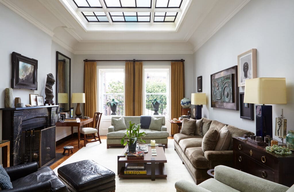 A living room designed by Sawyer | Berson.  The salvaged fireplace was found in New York. (Photo by Joshua McHugh)