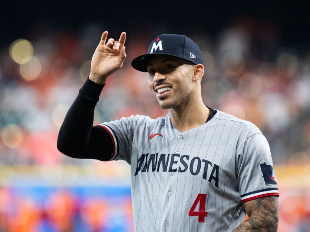 Carlos Correa didn't mind the boos, he still had fun in his playoff return to Houston. (Photo by F. Carter Smith)