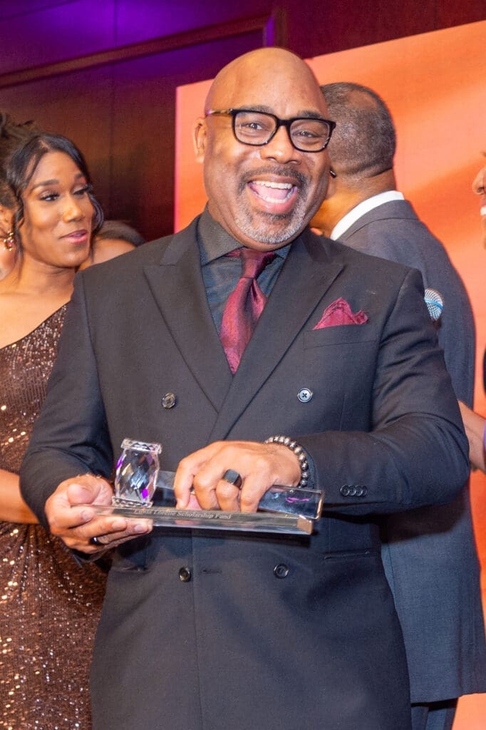 Board president Carlos Lewis at the Linda Lorelle Scholarship Fund 'Paying It Forward' gala. (Photo by Jacob Power)