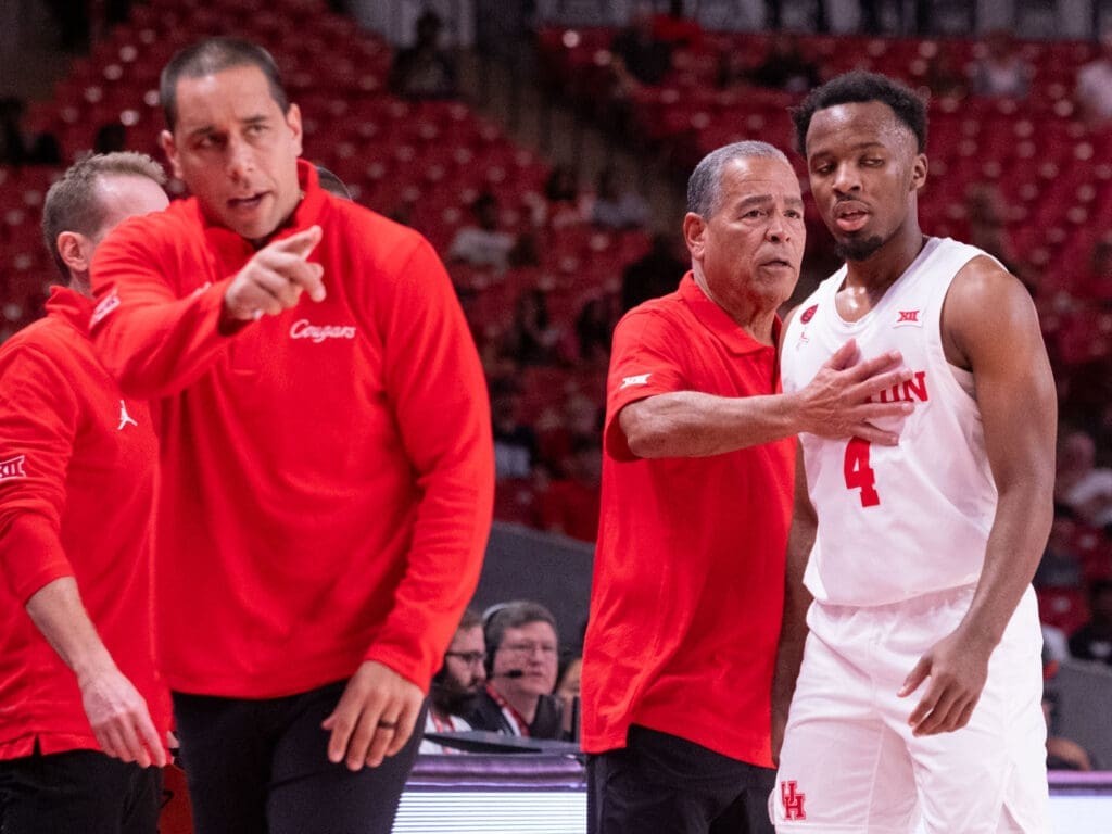 UH coaches Kellen Sampson and Kelvin Sampson know that teaching even experienced players like LJ Cryer is a process. (Photo by F. Carter Smith)